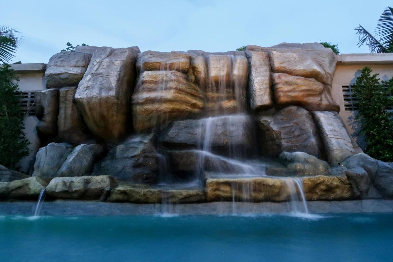 Craft Resort & Villas, Phuket Town Екстер'єр фото The waterfall at the resort